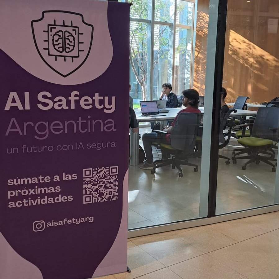 AI Safety Argentina banner at community event entrance